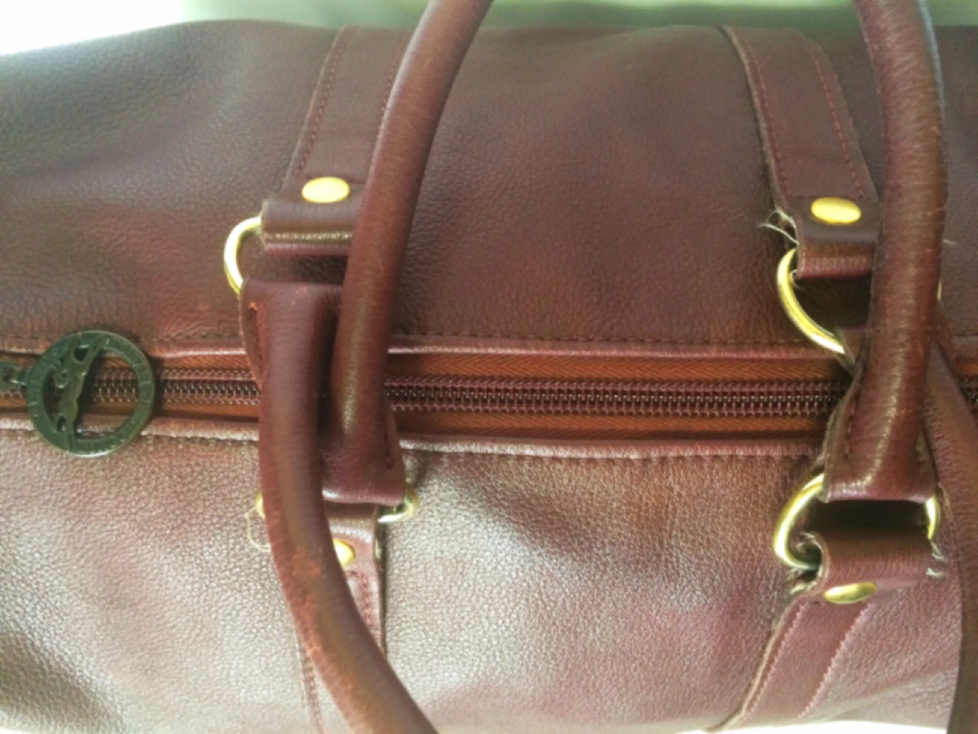 80's Vintage Longchamp rare dark wine leather duffle bag, mini travel purse. Classic bag for unisex use.